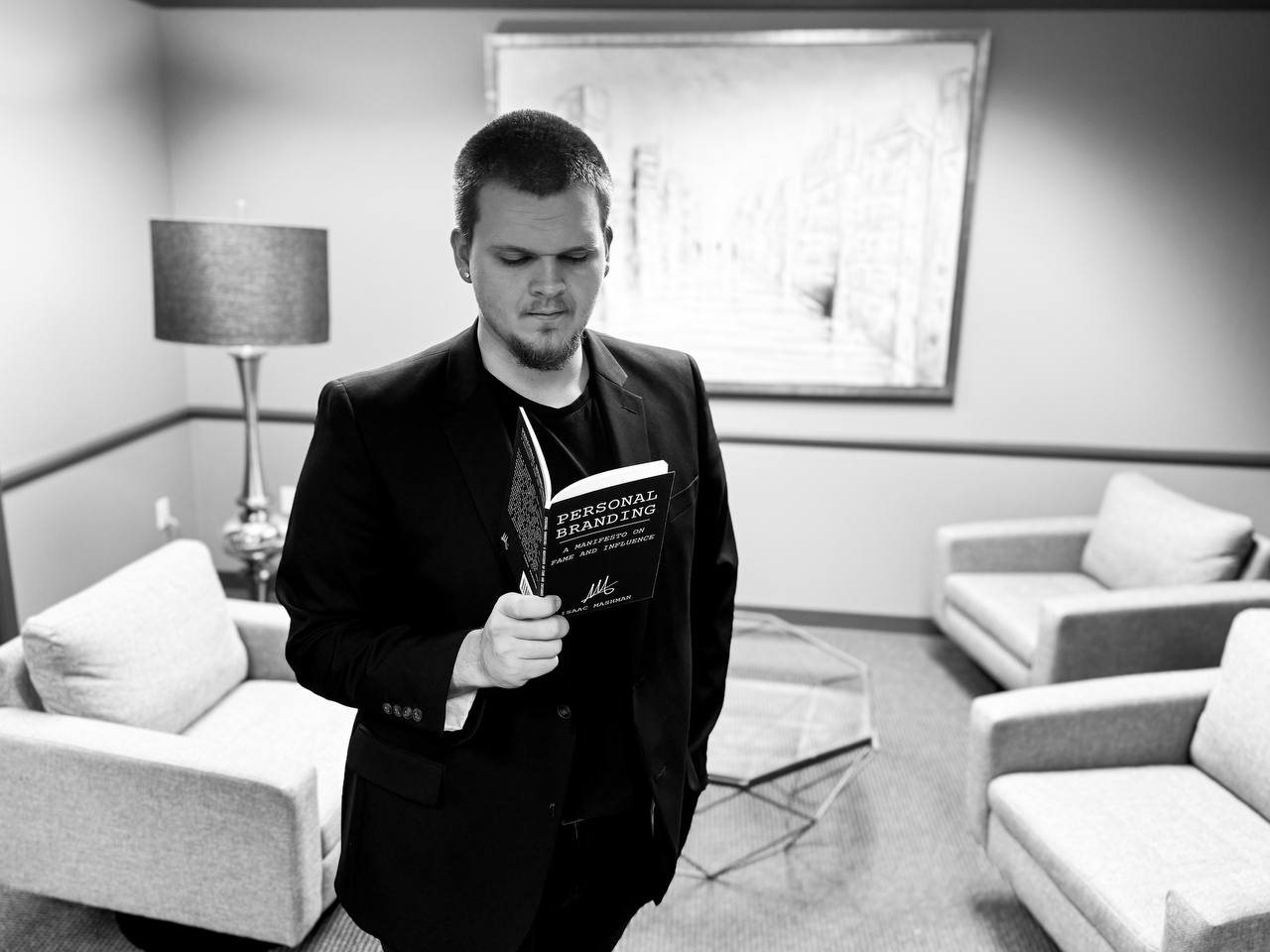 Isaac Mashman reading the First Edition of the Manifesto