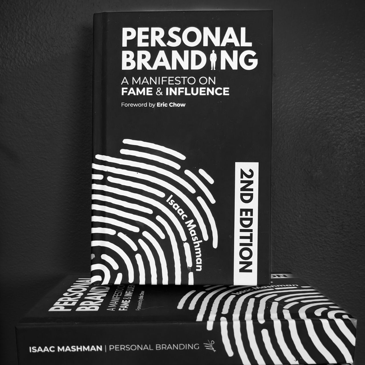 The Second Edition of the Manifesto in hardcover, stacked